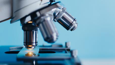 Precision in Focus: A Close-Up of Laboratory Microscope wallpaper