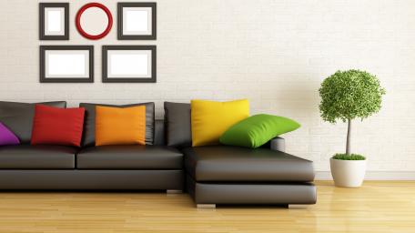 Modern Sofa in a Cozy Living Room Setting wallpaper