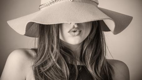Elegant Monochrome Portrait of a Woman in a Hat wallpaper