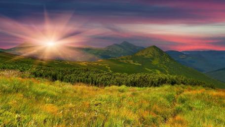 Majestic Sunrise Over Serene Mountains wallpaper