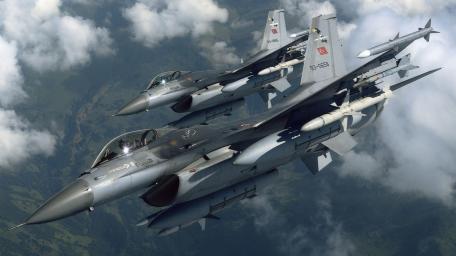 F-16 Fighter Jets in Flight Formation wallpaper