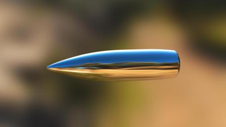 Sleek Silver Bullet in Motion wallpaper