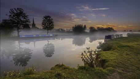 Misty River at Dawn in Wetlands wallpaper