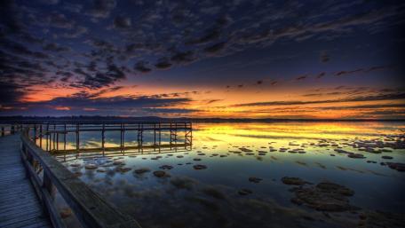 Serene Sunset Over Tranquil Waters wallpaper