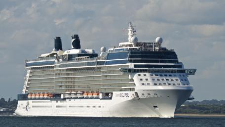 Elegant Ocean Liner Sailing Through Tranquil Waters wallpaper