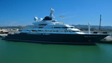 Luxurious Yacht Docked in Calm Waters wallpaper