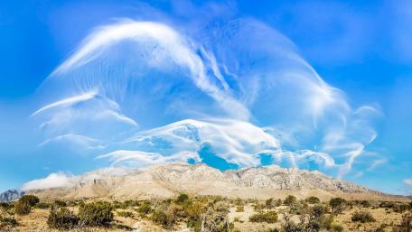 Majestic Mountains Under a Vibrant Sky wallpaper