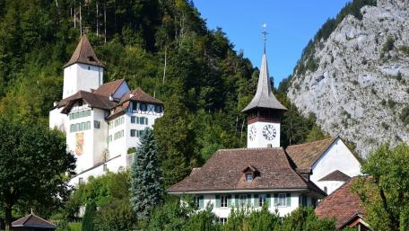 Charming Clock Tower in a Picturesque Town wallpaper