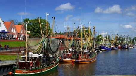 Serenity at the Riverside with Fishing Boats wallpaper