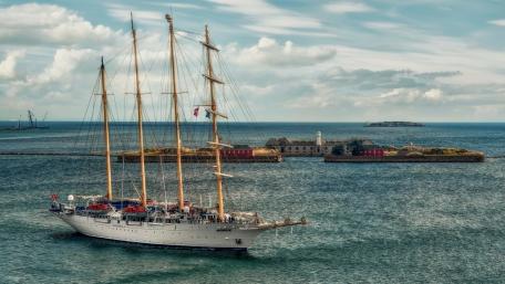 Elegant Sailing Ship on Tranquil Waters wallpaper