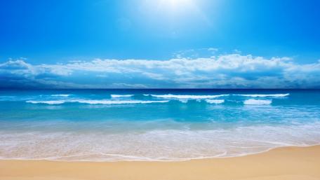 Tranquil Waves at Sandy Beach wallpaper