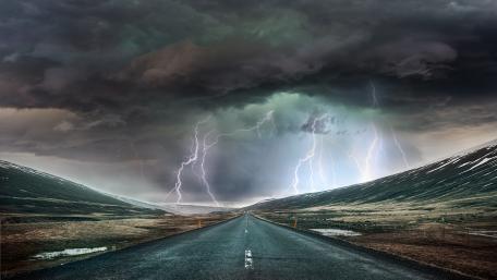 Lightning Illuminates the Stormy Road Ahead wallpaper