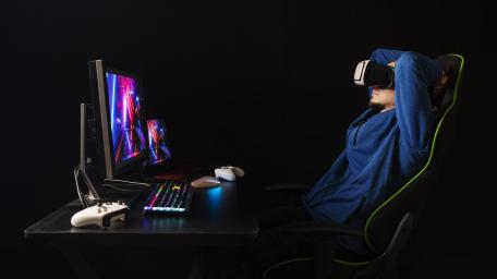 Gamer Immersed in Virtual Reality wallpaper