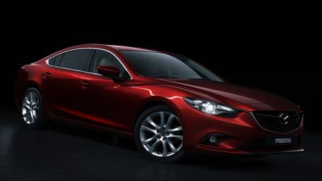 Sleek Mazda Elegance in Dark Surroundings wallpaper