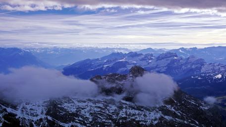 Majestic Mountain Summit View Above the Clouds wallpaper