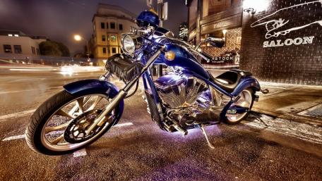 Midnight Ride on a Glimmering Motorcycle wallpaper