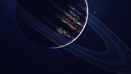 Majestic Ringed Planet in Cosmic Void wallpaper