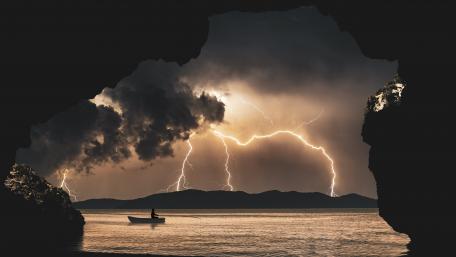 Thunderstorm over Tranquil Waters wallpaper