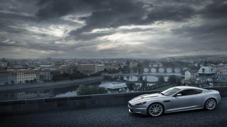 Sleek Aston Martin Under Dramatic Skies wallpaper