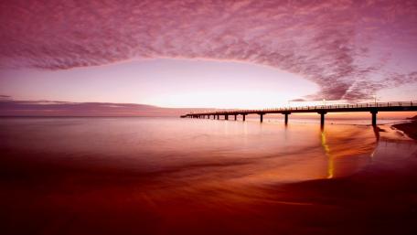 Serene Sunset Over Calm Waters wallpaper