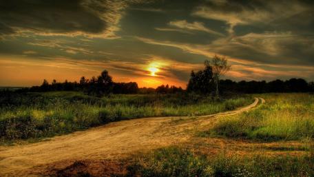 Sunset Over Winding Country Path wallpaper