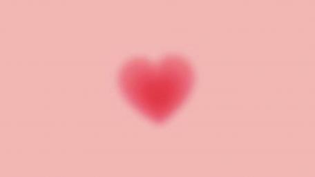 Red Heart on Soft Focused Pink Background wallpaper