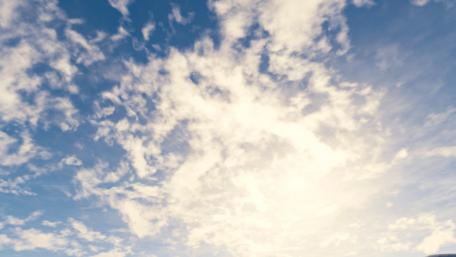 Serene Blue Sky with Fluffy Clouds wallpaper