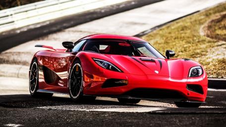 Sleek Red Koenigsegg Agera in Action wallpaper