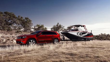 Adventure Awaits with Jeep and Motorboat Ready for Fun wallpaper