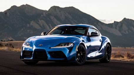 Toyota GR Supra in Majestic Mountains wallpaper