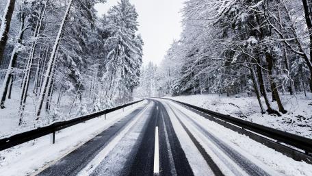Winter's Silent Forest Road wallpaper