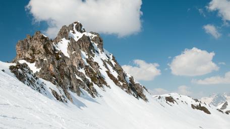 Majestic Snow-Capped Mountain Ridge wallpaper