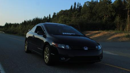 Sleek Black Honda on the Open Road wallpaper
