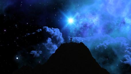 Celestial Peaks Under a Starry Sky wallpaper