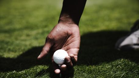 Hand on the Golf Ball Ready to Play wallpaper
