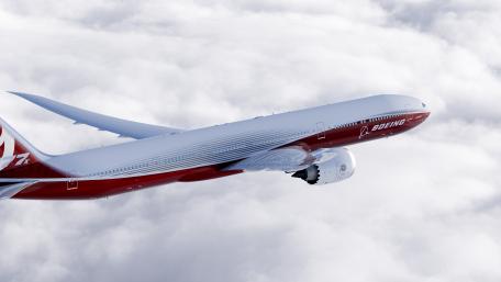 Boeing 777X Airliner Above the Clouds wallpaper