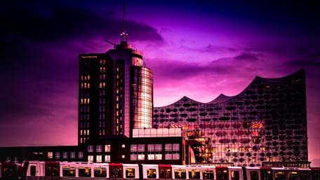 Purple Dusk Over Modern Cityscape wallpaper