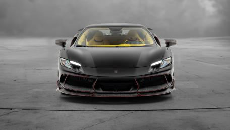 Sleek Ferrari 296 GTB Power Pose wallpaper