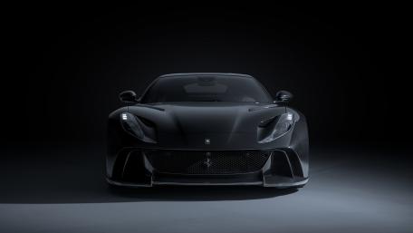 Sleek Black Supercar Mystery wallpaper