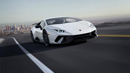 Speeding Lamborghini Huracan on Highway wallpaper