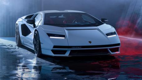 Sleek Supercar in Misty Ambiance wallpaper
