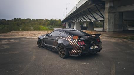 Sleek Ford Mustang GT Under Urban Overpass wallpaper
