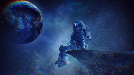 Astronaut on a cliff wallpaper