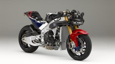 Honda RC213V Motorcycle Poised in Studio Light wallpaper
