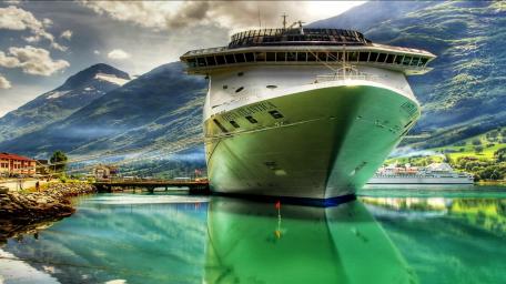 Cruise Ship Tranquillity in Majestic Mountains wallpaper