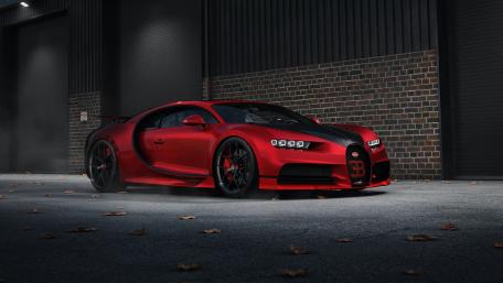 Red Hot Bugatti Chiron in Urban Setting wallpaper