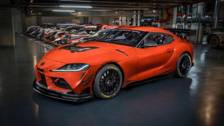 Sleek Sports Car Toyota GR Supra Showroom Elegance wallpaper