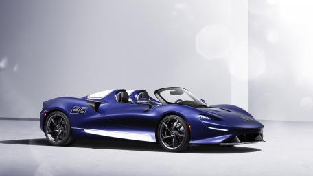 Sleek Blue McLaren Elva Sports Car Showcase wallpaper