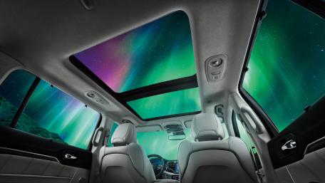 Aurora Skies Through The Sunroof wallpaper
