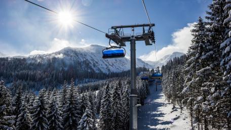 Winter Adventure with Ski Lift Views wallpaper